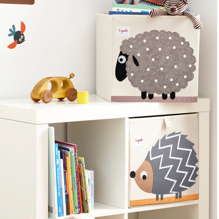 3 Sprouts Toy Storage Box (Sheep) filled with toys in a child's room