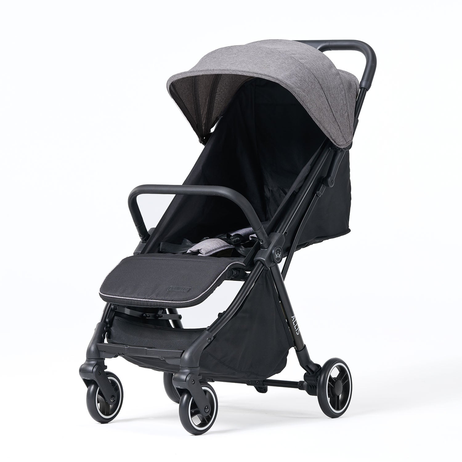 Black and gray flick stroller on a white background