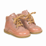 Angulus lace-up shoe is made from shiny patent leather with elegant brogue-style stitching.