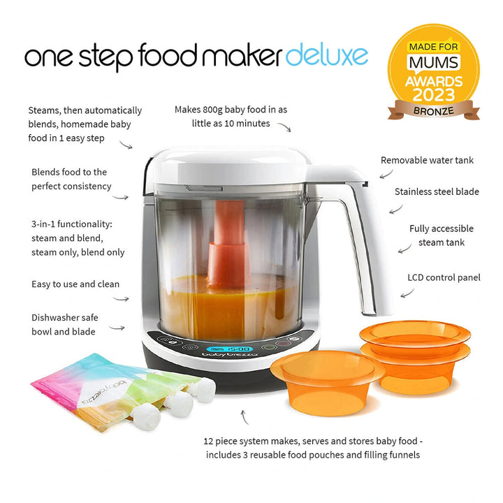 Baby Brezza Food Maker Deluxe in use, steaming colorful vegetables in the bowl.