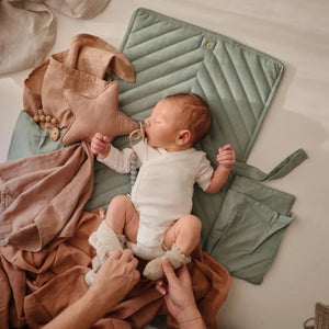 Baby on cotton diaper pouch roman green mushie