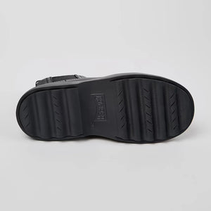 Stylish and comfortable black ankle boots for kids by Camper.