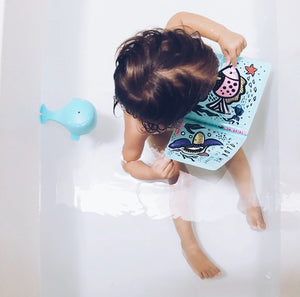 Colourful ocean bath book with fish, octopus, after being in the water