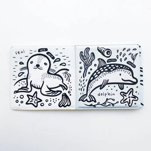 Colorful bath book with water animals after being dipped