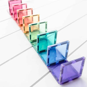 Family playing together with magnetic building set.