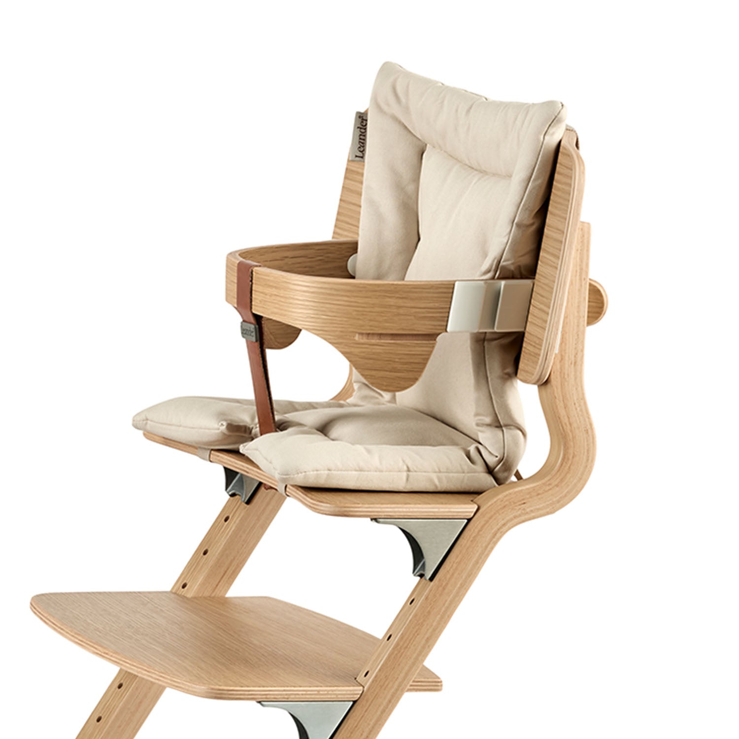 Louie highchair with safety bar for extra support and cushion for comfort.