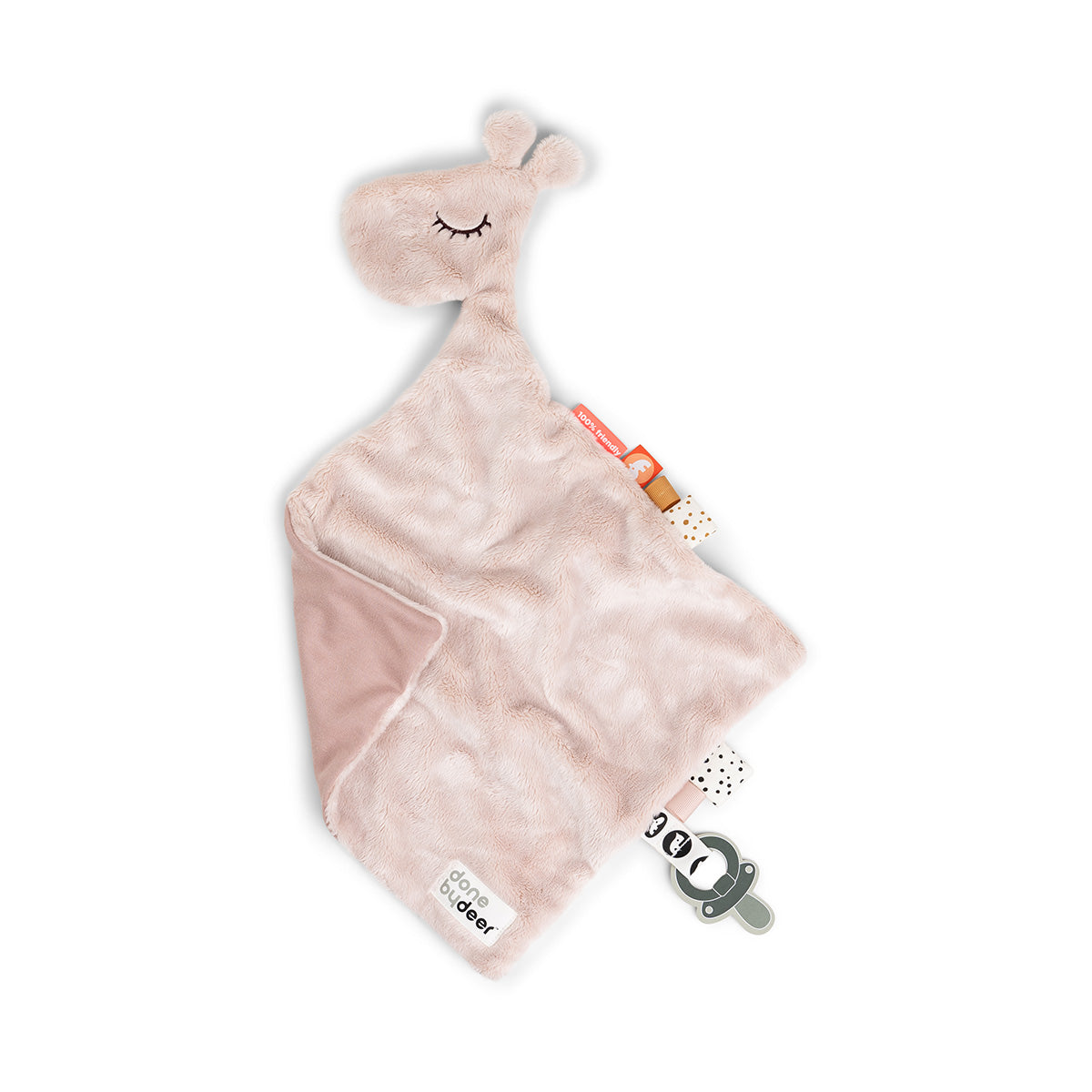 Pink plush toy with a pacifier clip on a white background