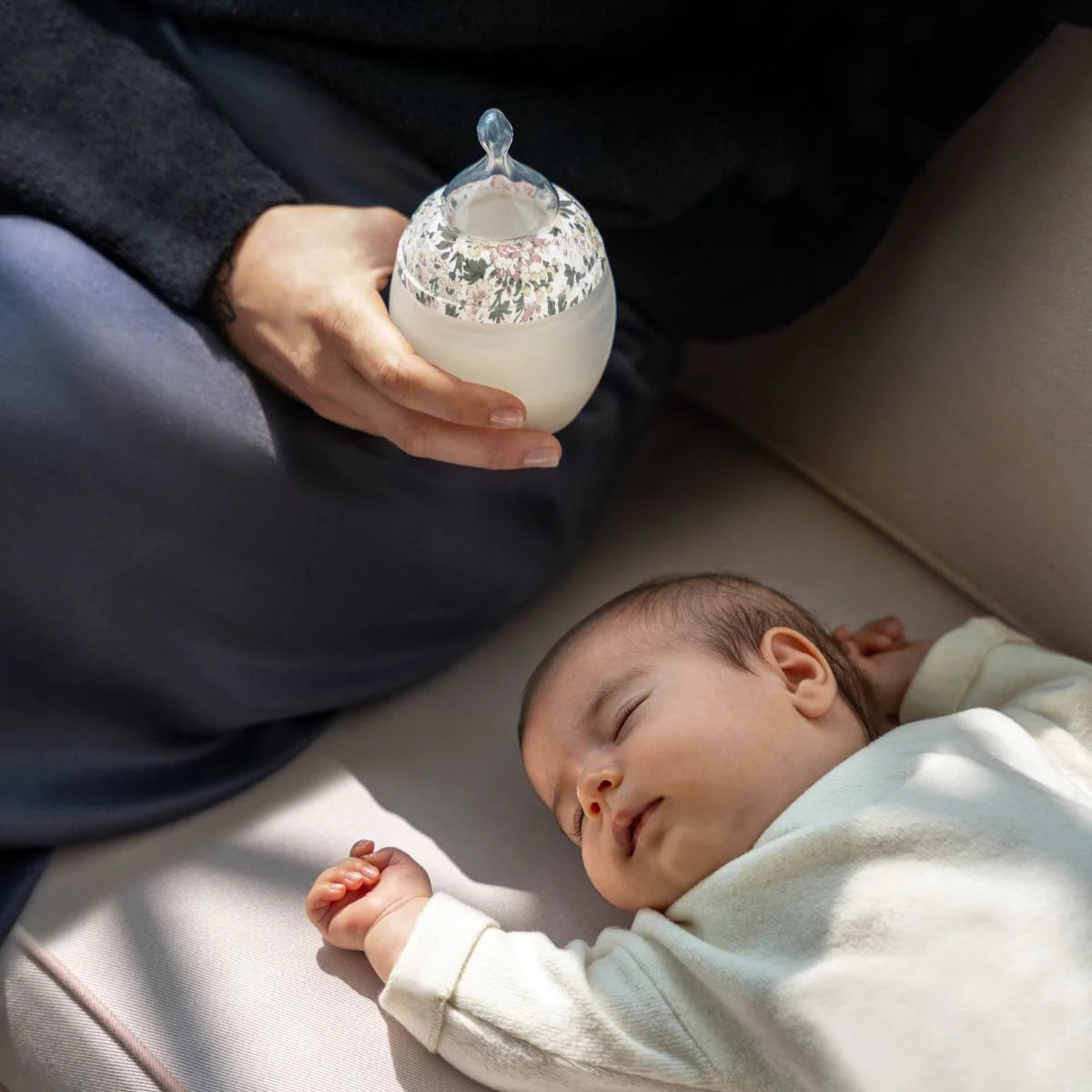 Soft silicone baby bottle with calming feeding design