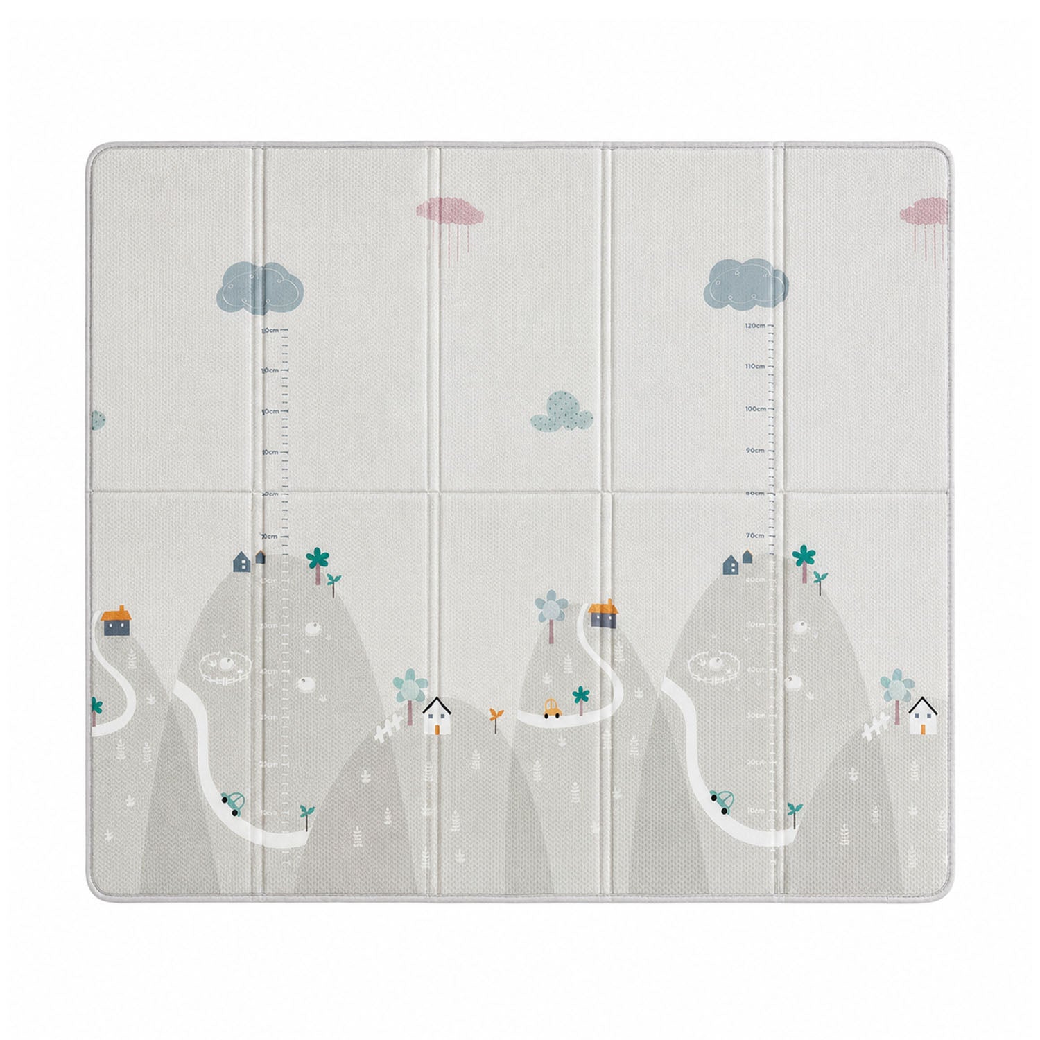 A tablet case with a playful children's landscape print, featuring stylized mountains, winding roads, small houses, trees, and clouds on a light gray background. The case is designed with built-in measurement scales on the left and right sides.