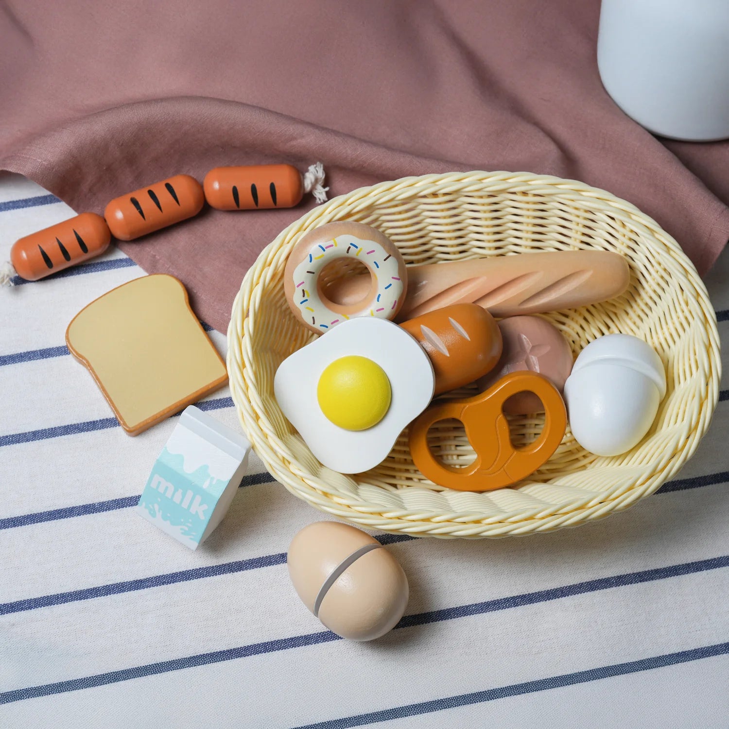 Child-safe wooden toy food is ideal for pretend kitchen play.