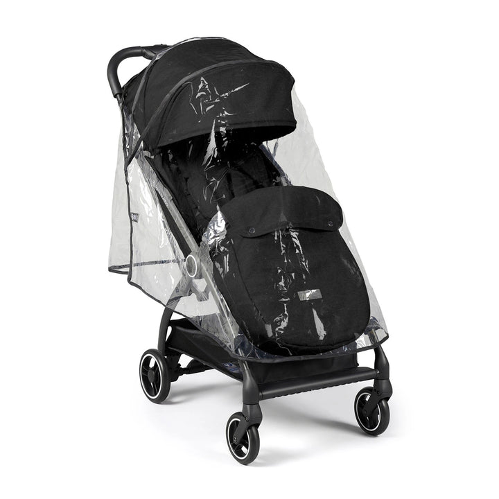 Ickle Bubba Aries Auto-Fold Stroller in black, equipped with a clear rain cover for all-weather use.