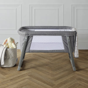 Compact Ickle Bubba rocker crib with mesh panels for breathability.