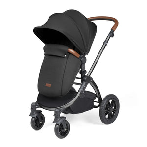  Ickle Bubba pushchair with footwarmer and hood in a white background.
