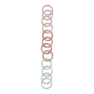 Colorful baby toy links from little dutch little loops chain fairy garden on plain white background