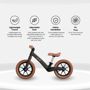 This is a side view of the LUMI Balance Bike, which features puncture-proof tyres and comfortable rubber grips.
