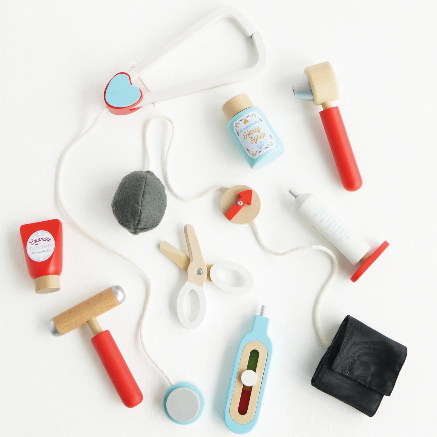 Colorful wooden thermometer and medical tools.