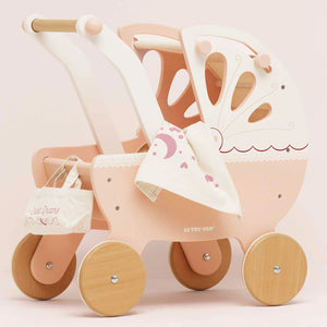 Close up view of Le Toy Van pram toy