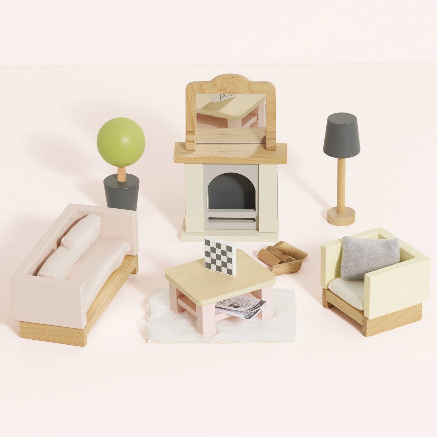 Le Toy Van wooden dolls living room furniture set comes with 19 individual accessories.