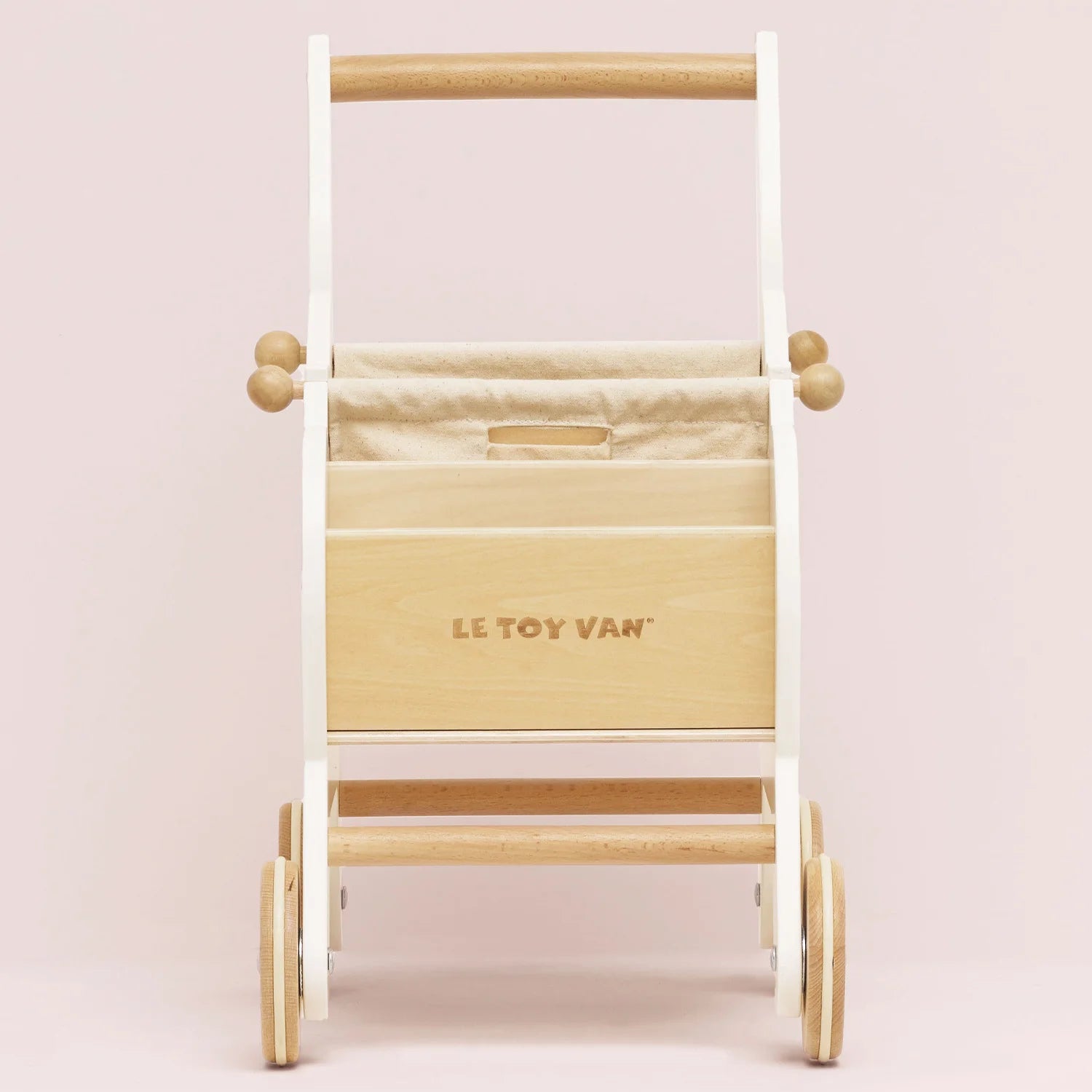 Le Toy Van wooden shopping trolley.