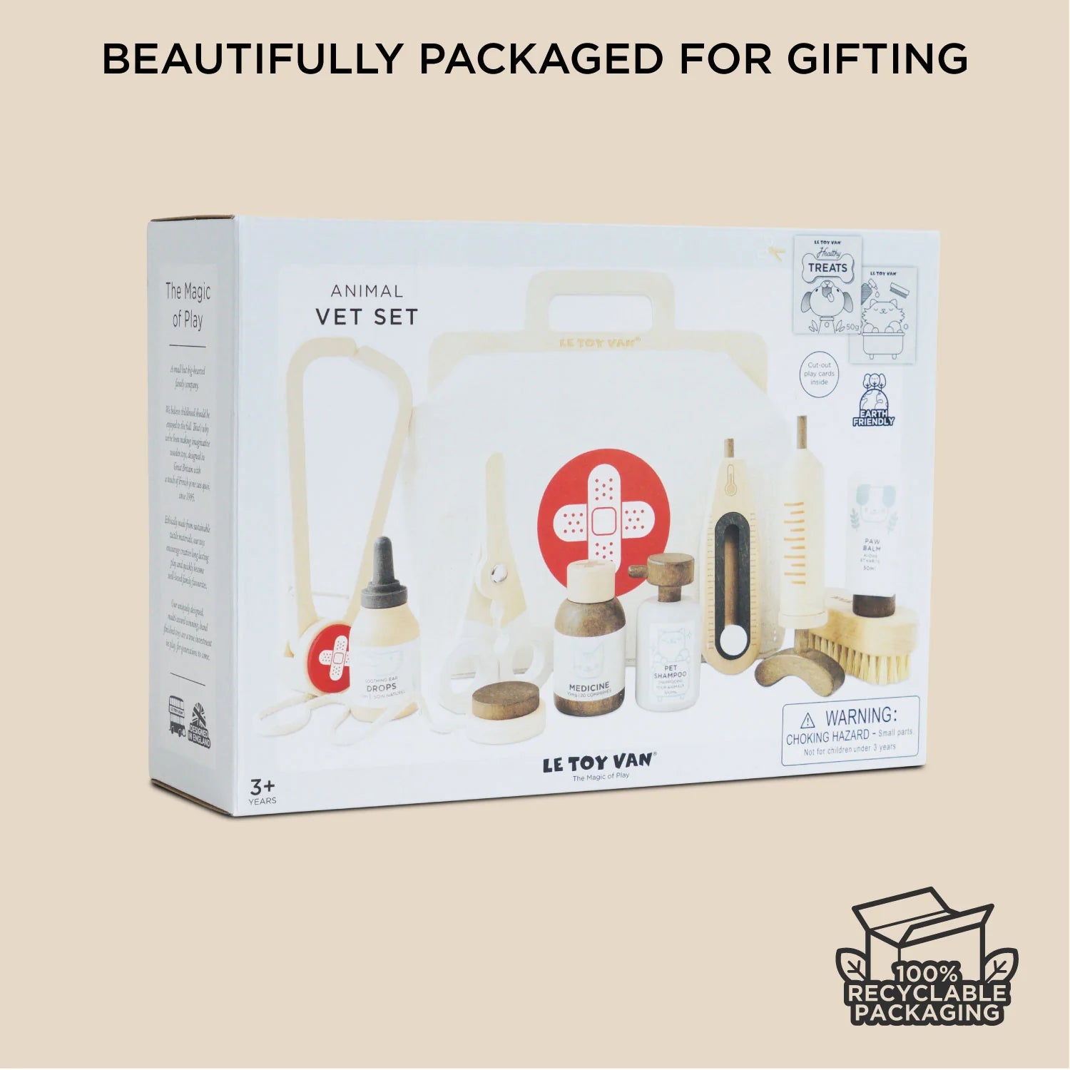 Le Toy Van animal vet set packaging on a beige background with 'Beautifully packaged for gifting' text.