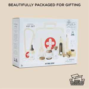 Le Toy Van animal vet set packaging on a beige background with 'Beautifully packaged for gifting' text.