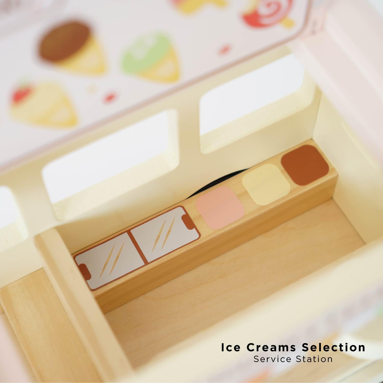 Miniature ice creams and treats inside wooden ice cream van