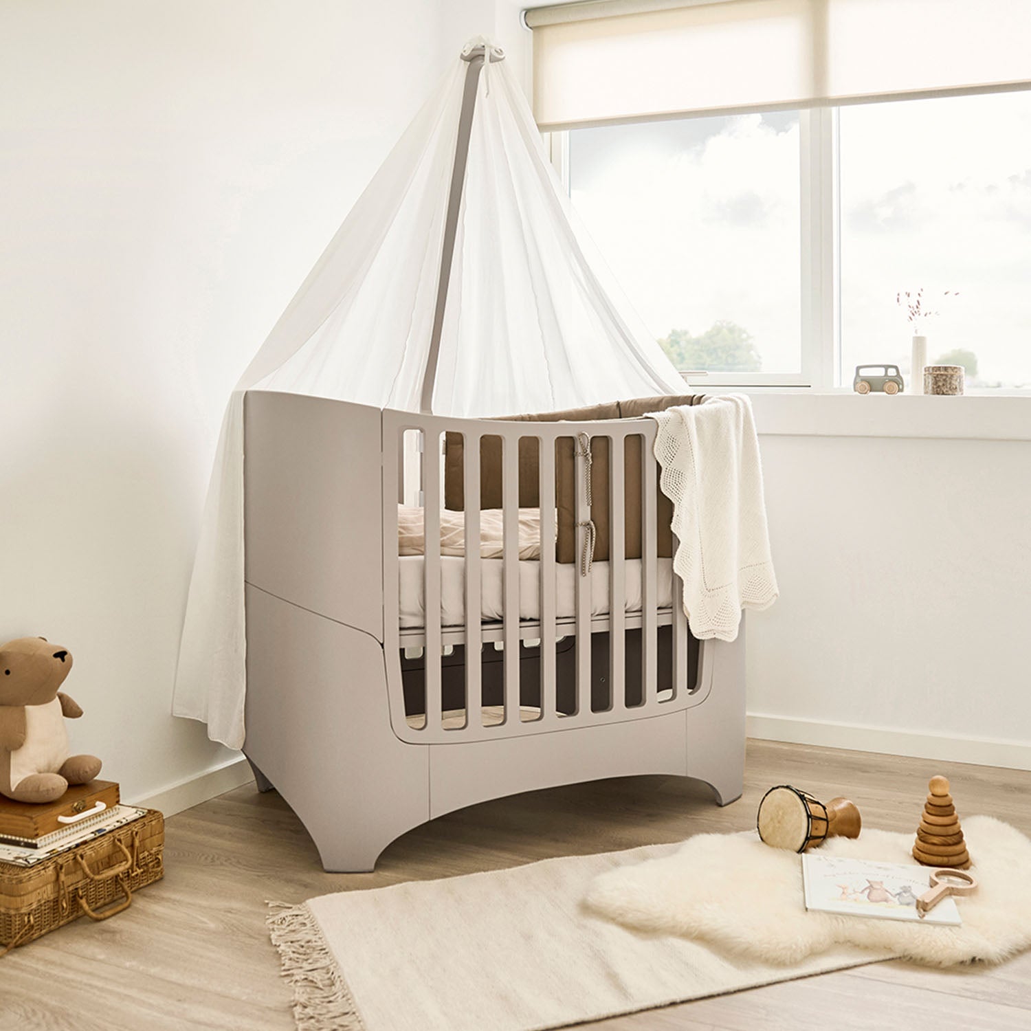 Nursery corner styled with Leander Classic crib and accessories.