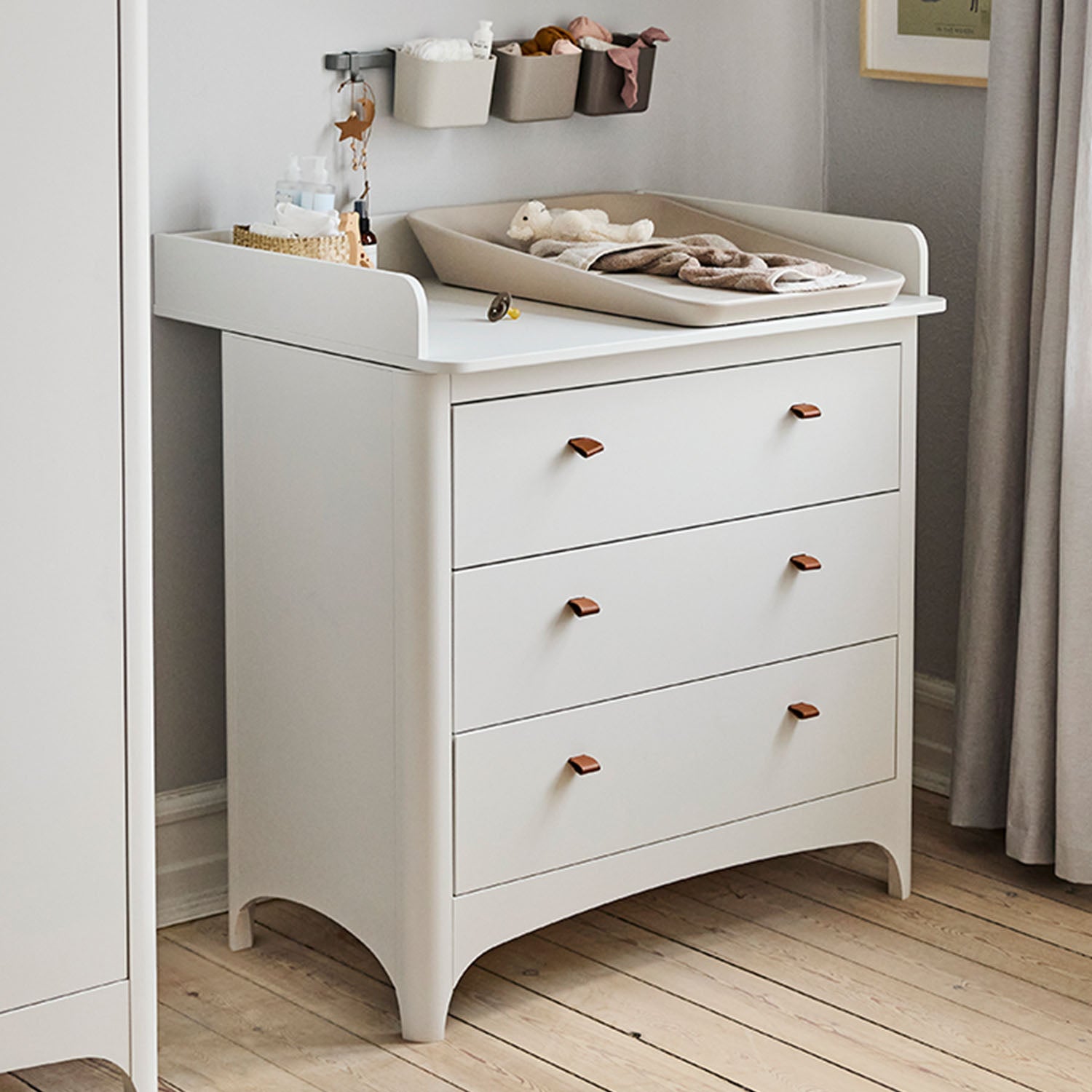 Nursery room styled with the Leander Classic™ dresser for organized storage.