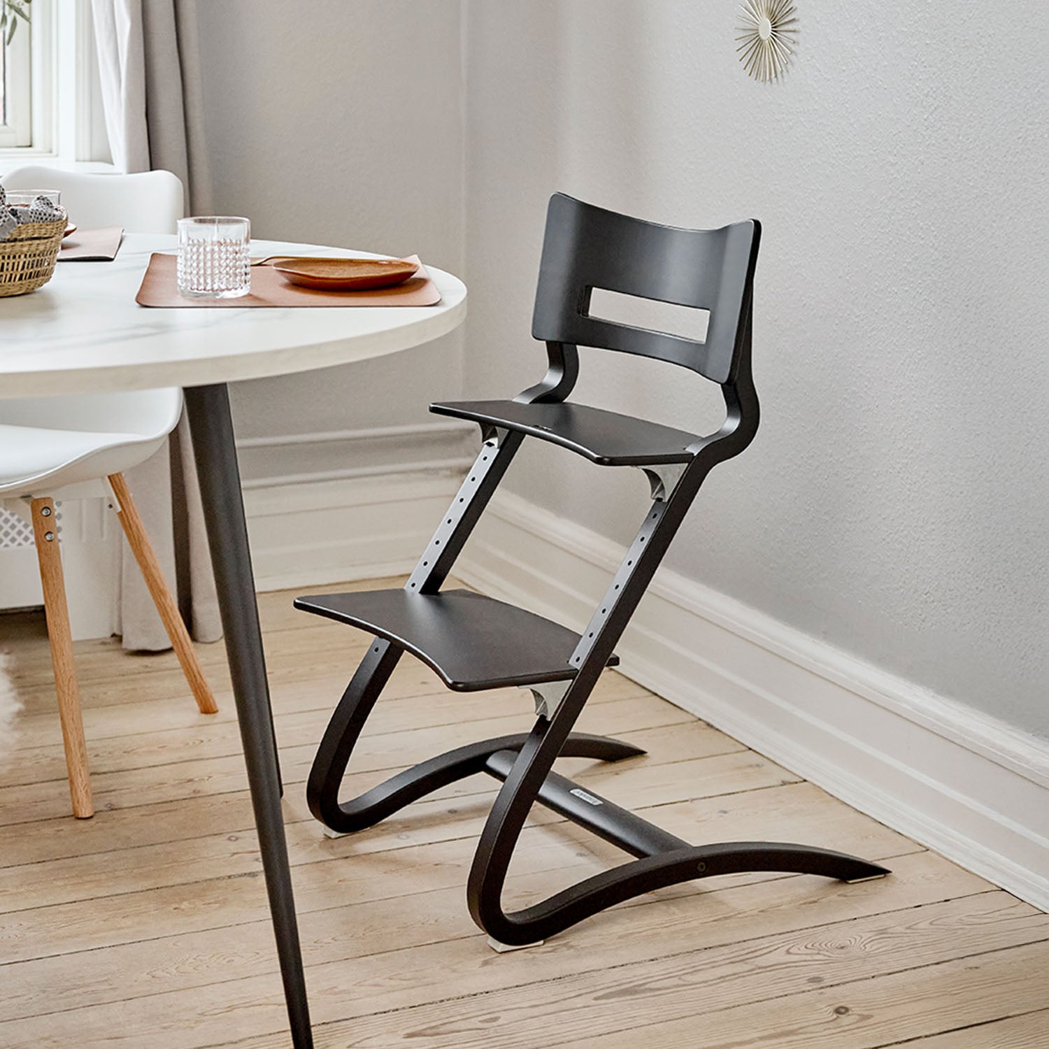 Leander highchair can be used without the safety bar for an older child.