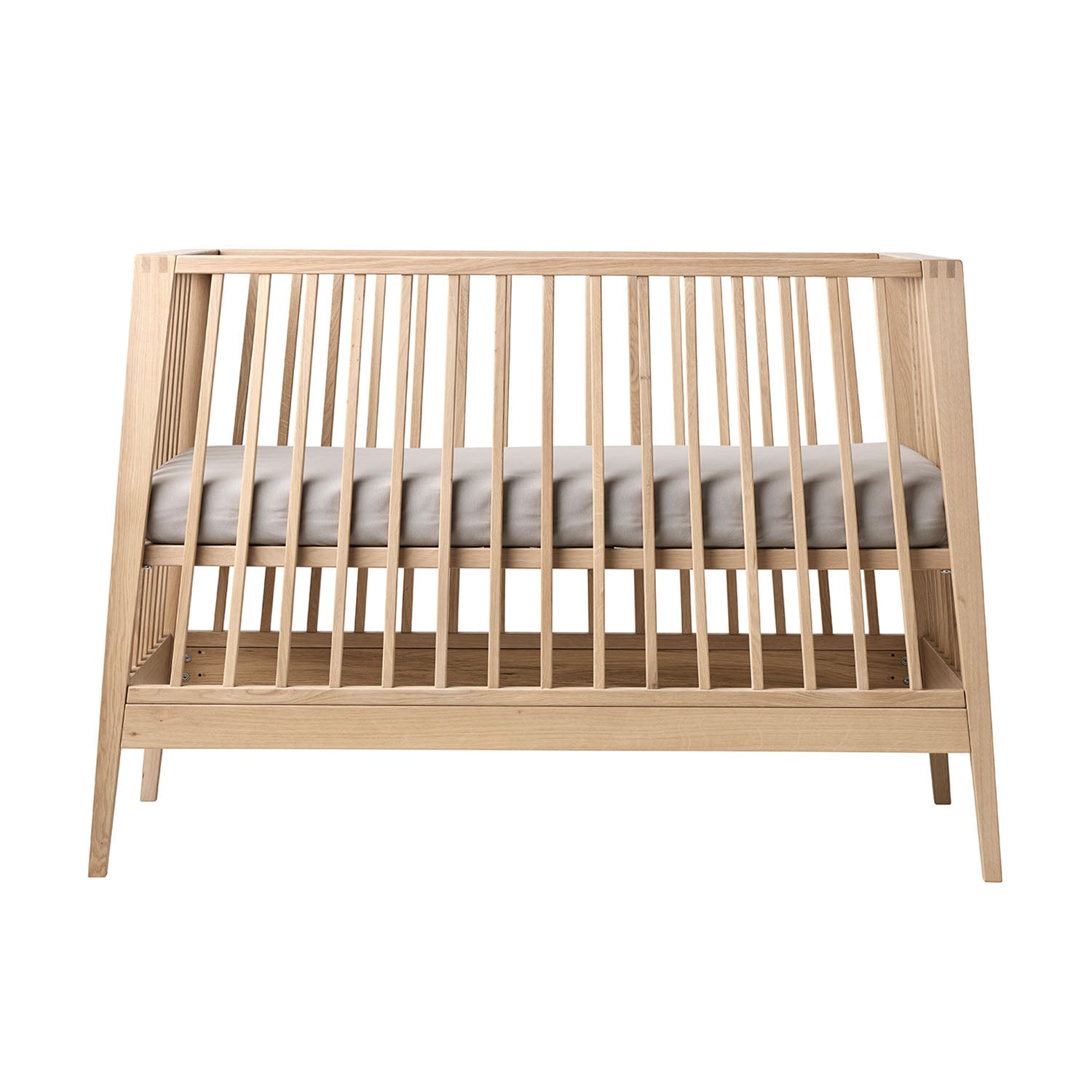 Leander Linea baby cot in oak colour.