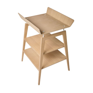 Wooden baby changing unit with modern Scandinavian design.