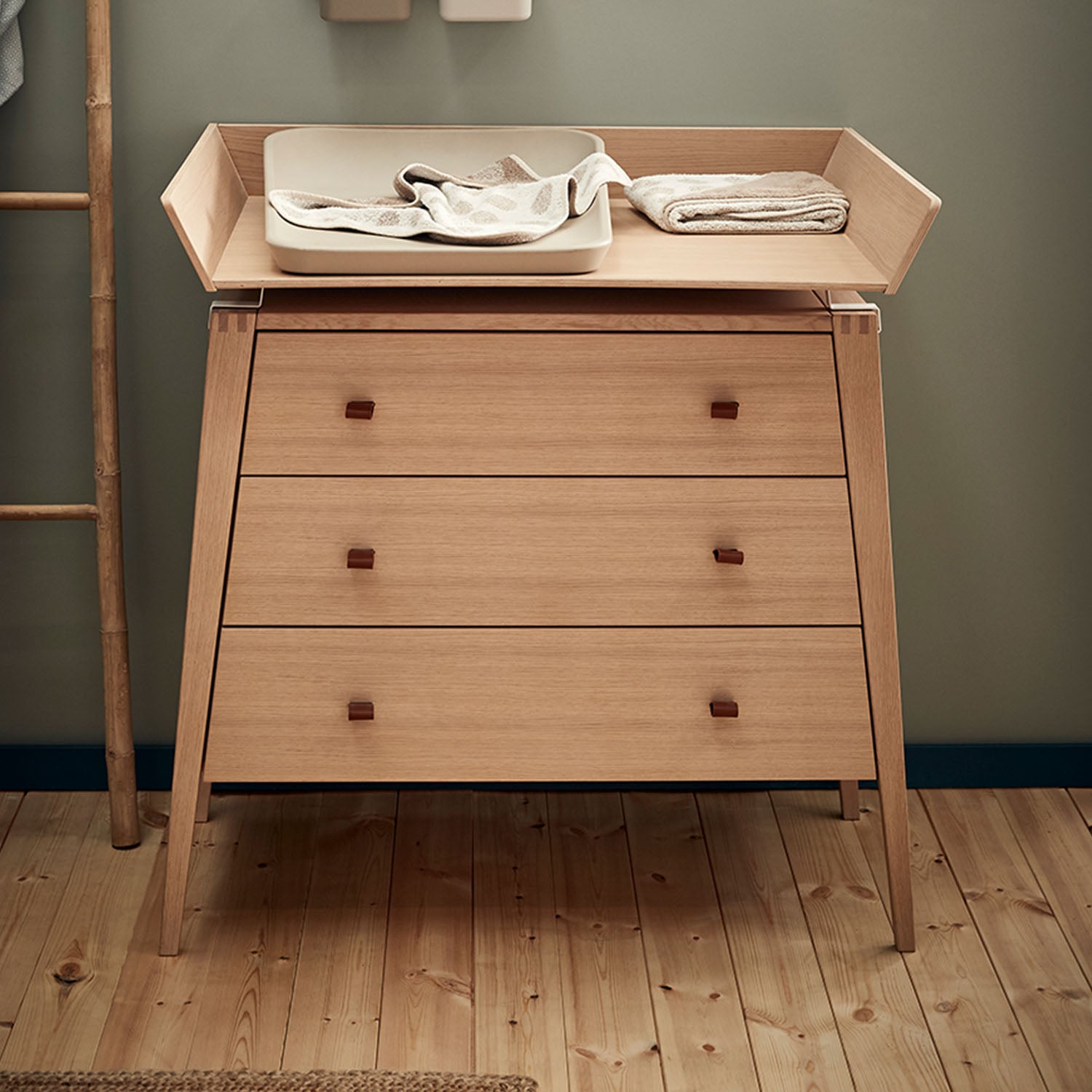 Leander Linea dresser with attached changing unit in a nursery.