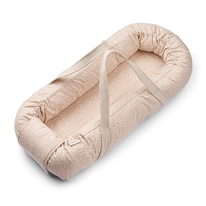 Straight-on full length view of Liewood Gro Baby Lift, portable baby nest and lift
