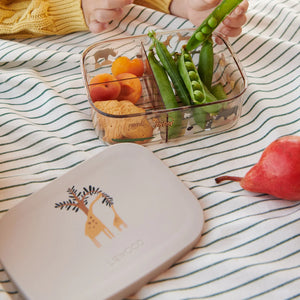 Children are eating from their lunch box.