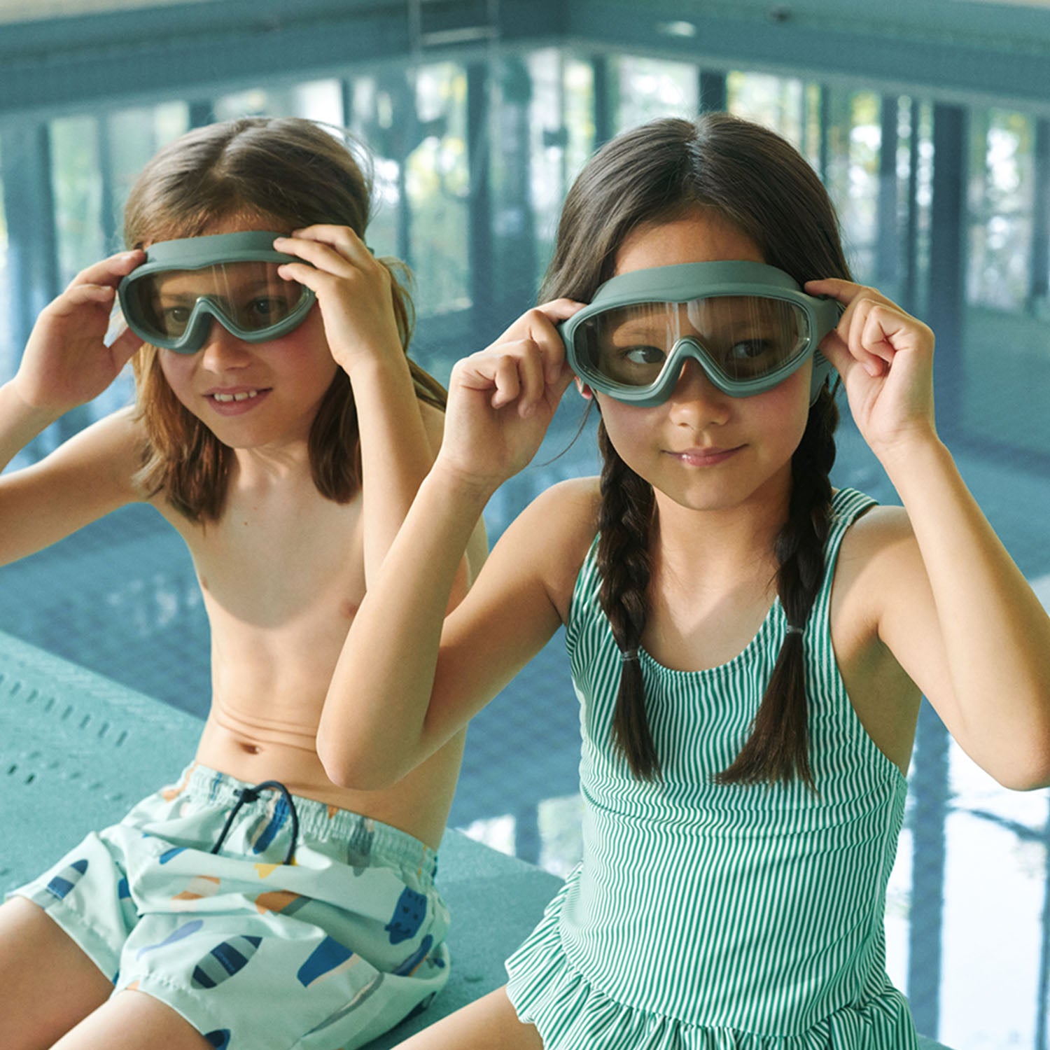 Liewood Kerem swim goggles worn by children in pool