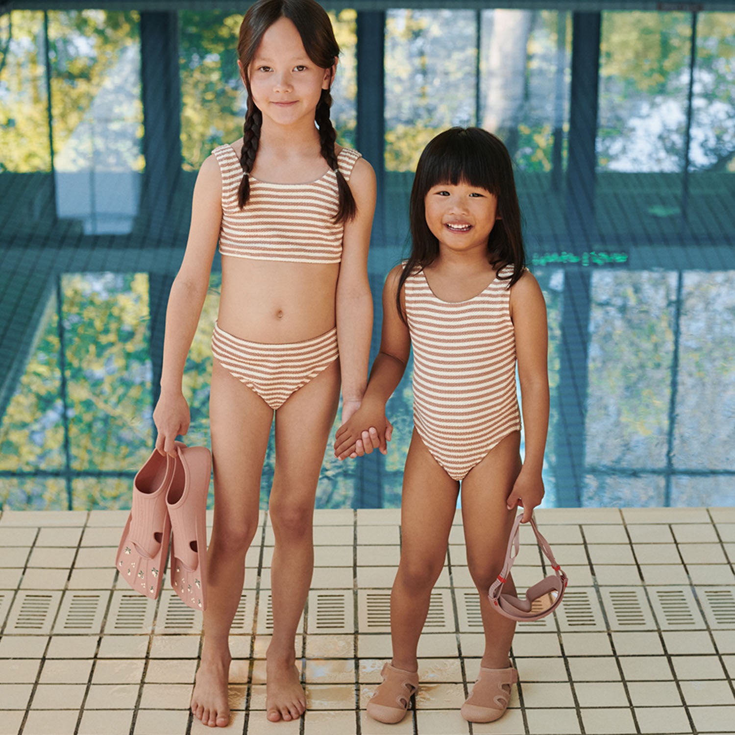 Brightly colored Liewood Kerem goggles for water play.