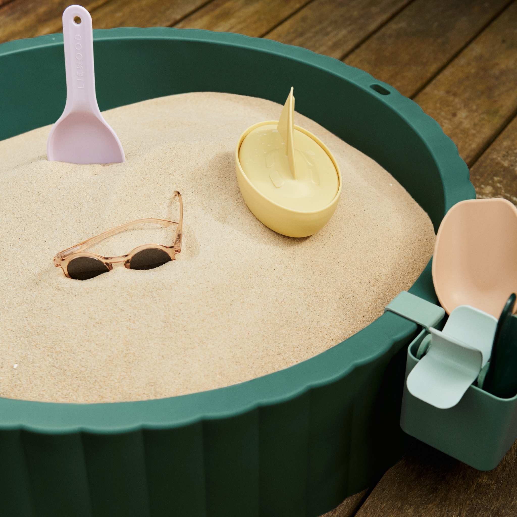 Safe and colorful outdoor sandpit for toddlers and children.