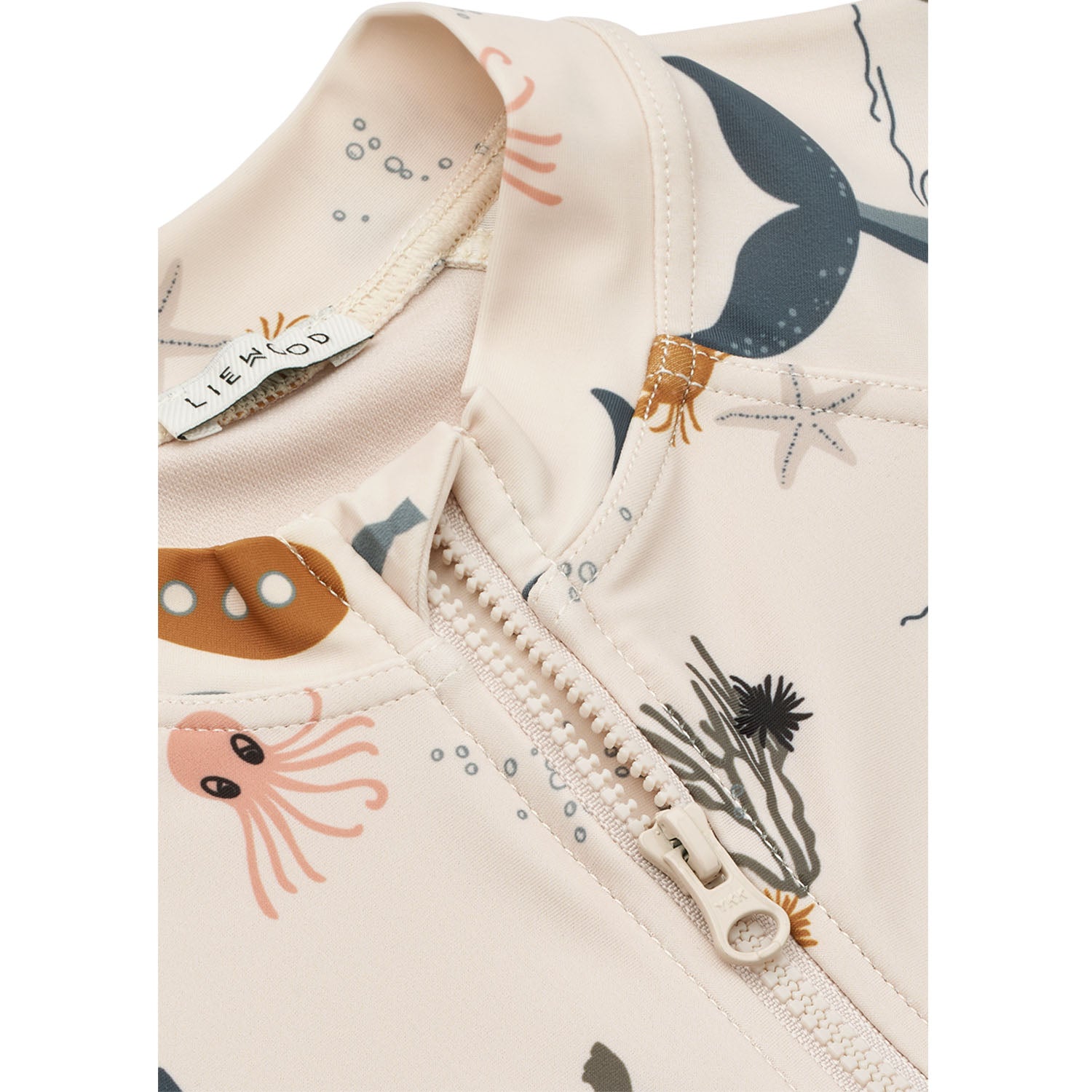 Close view of liewood swim jumpsuit - sea creature, sandy. 