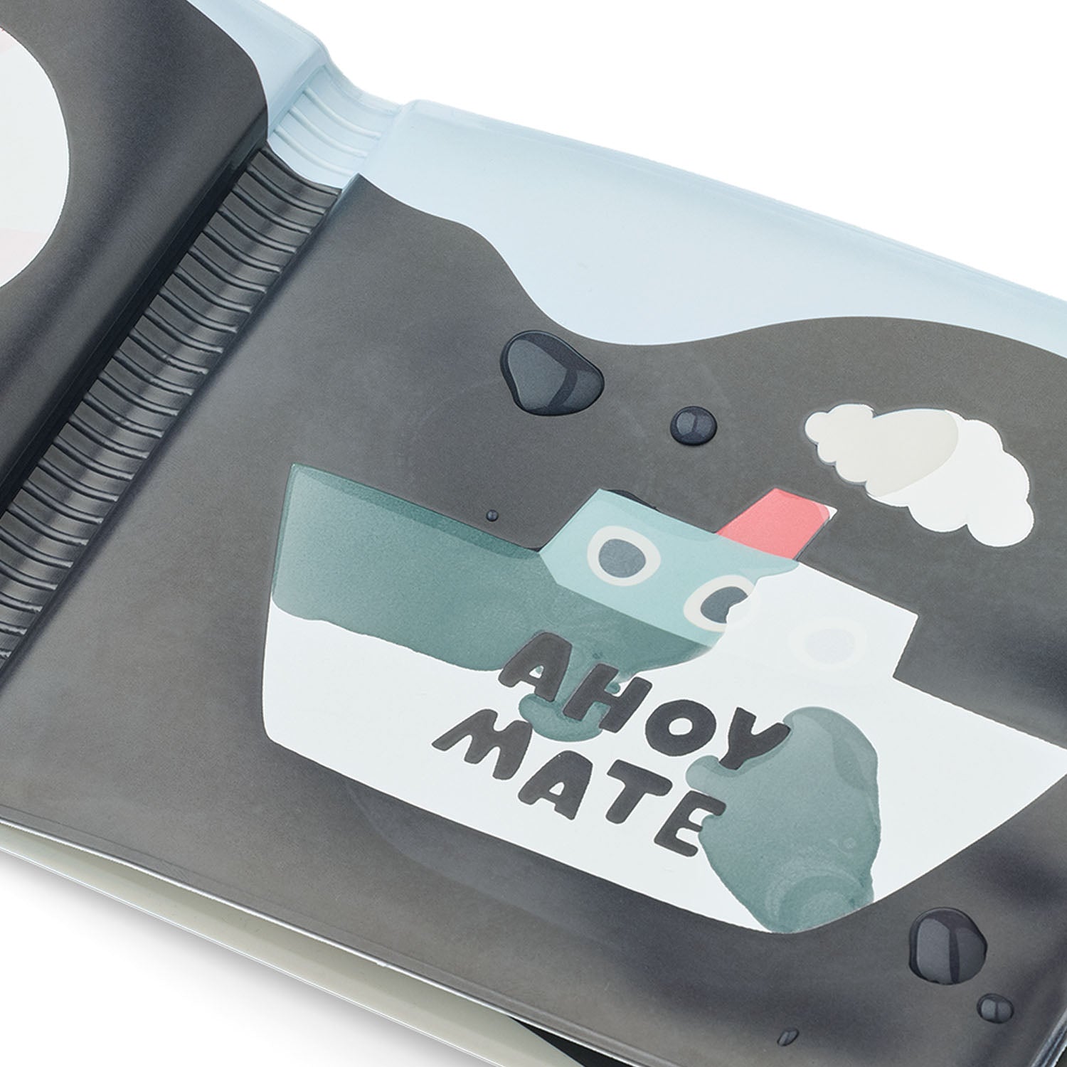 Close-up of water changing the page colors.