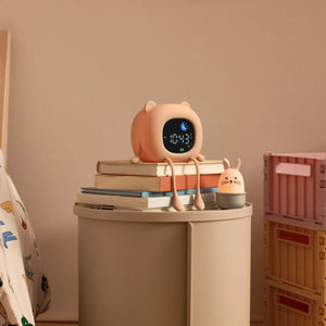 Liewood DANI Sleep Trainer glowing gently at night
