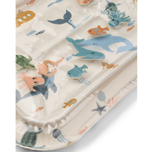 Inflatable edge providing soft support for baby.