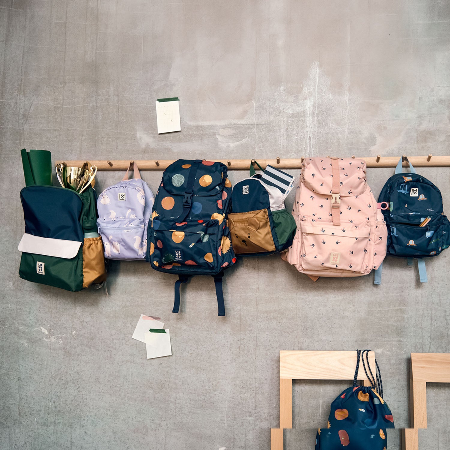 Liewood school backpack displayed neatly on a hanging rail