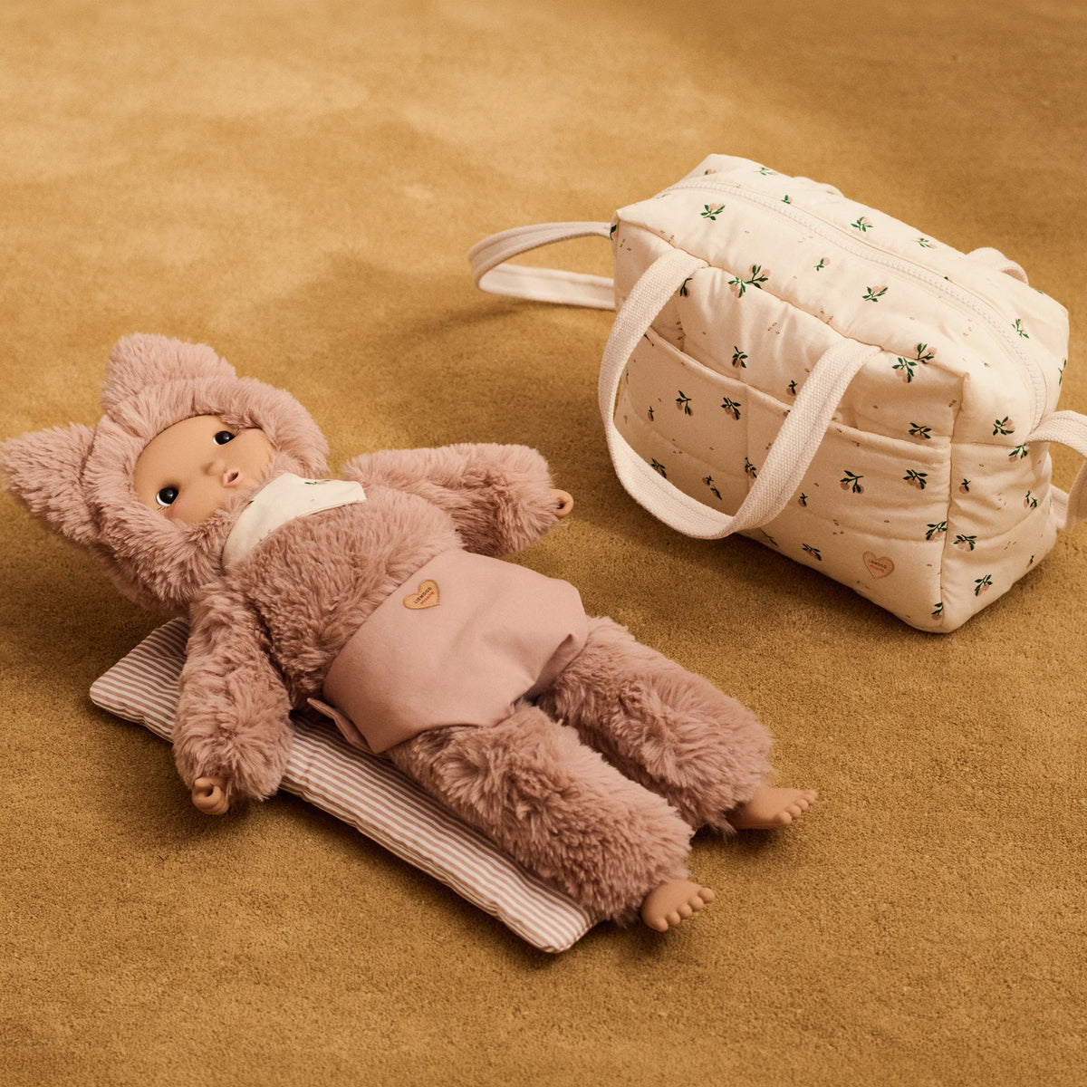 Liewood Misa Cleo doll laid flat Pale Tuscany with accessories