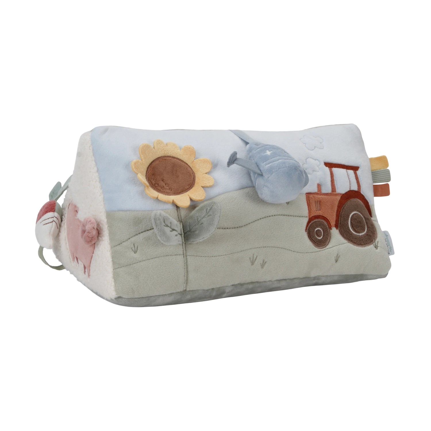 Children's soft toy with farm-themed elements on a white background