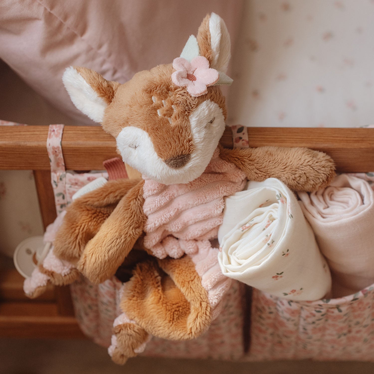 Soft deer comfort cloth from Little Dutch displayed on a nursery bed