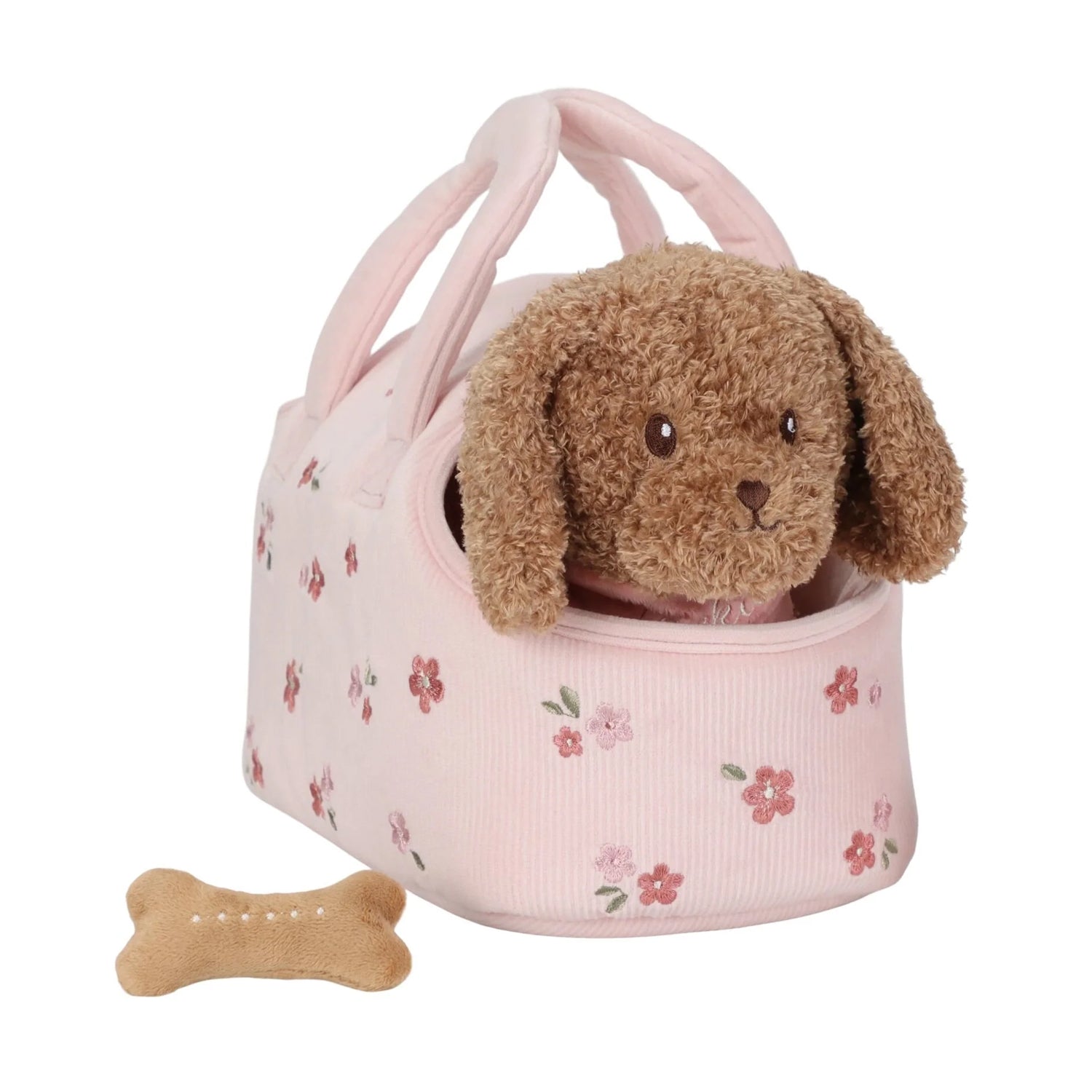 Floral-patterned pet carrier with a plush dog toy and bone-shaped treat on a white background