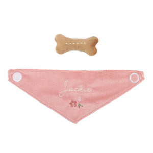 Pink dog bandana with embroidered name and flowers, accompanied by a bone-shaped treat on a white background.