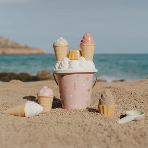 Complete beach toy set with scoop, bucket, and four molds.