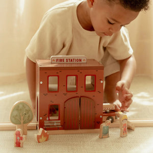 Little Dutch wooden fire station with sliding pole and accessories.