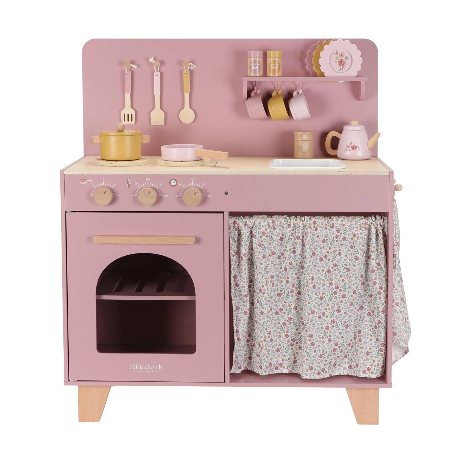 Pink toy kitchen set with various accessories on a white background
